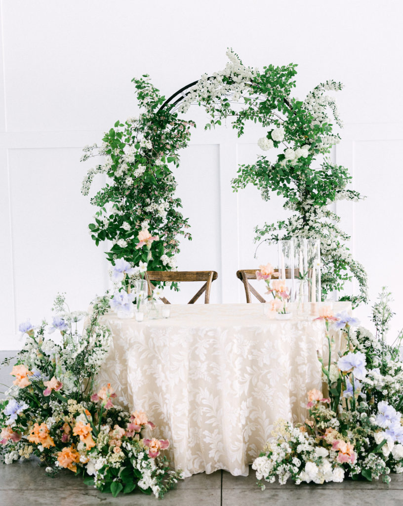 Floral arch transitioned from ceremony to reception