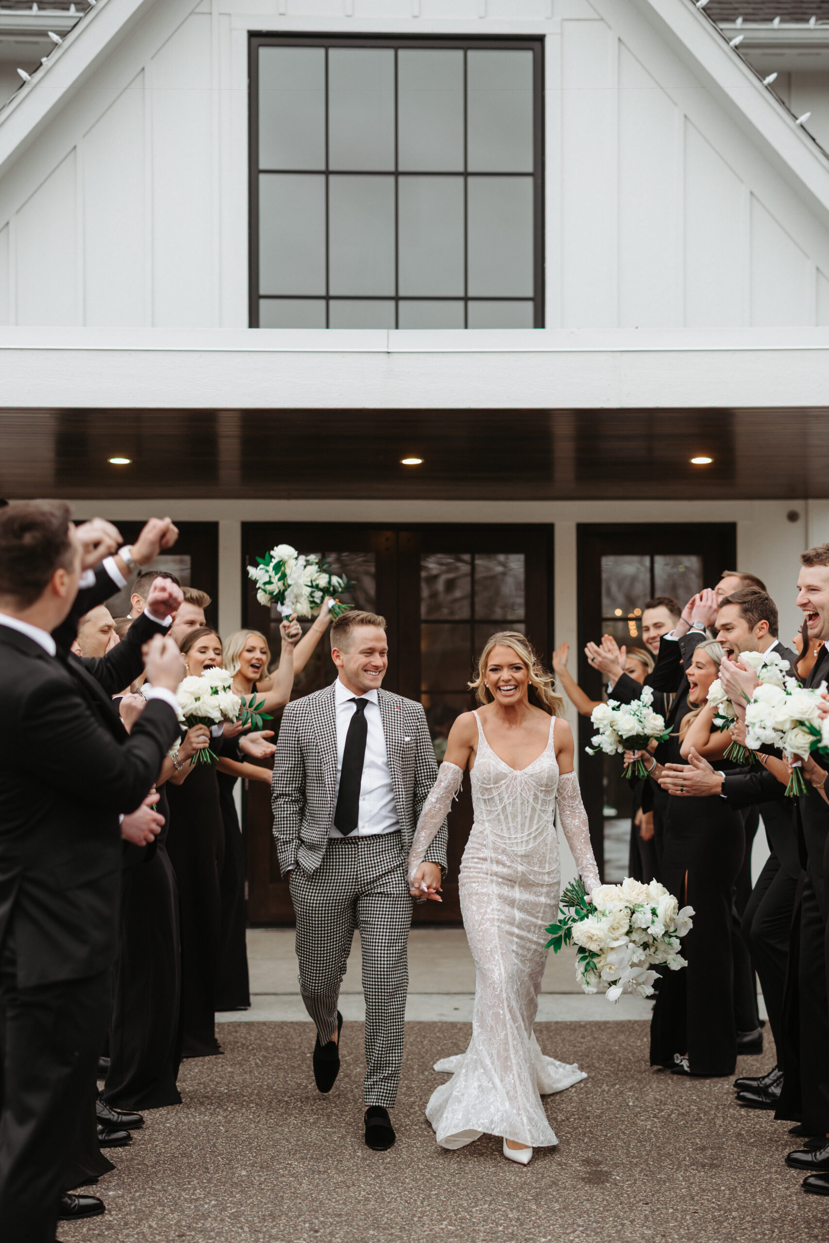 New Year's Eve winter wedding party outside The Hutton House