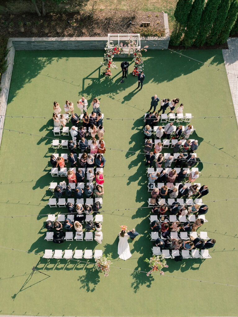 At this stage in your wedding planning timeline, it is a good to plan your wedding ceremony details such as music, readings, and timeline.