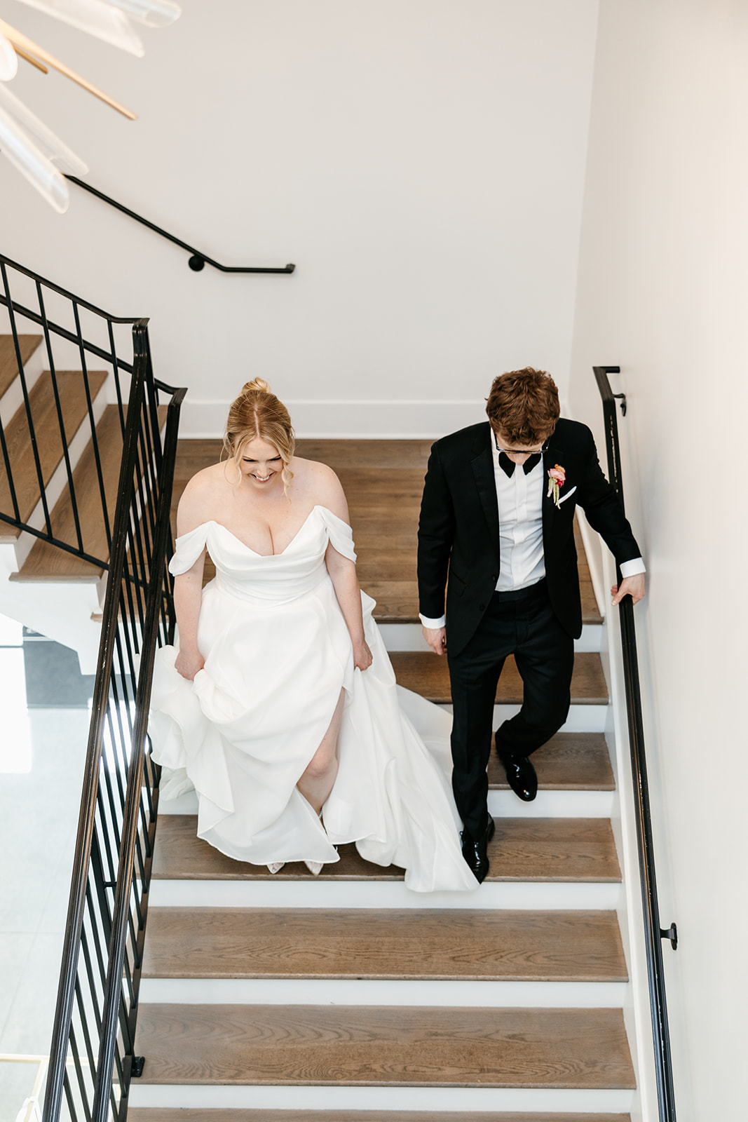 Bride and Groom entering their wedding reception at The Hutton House