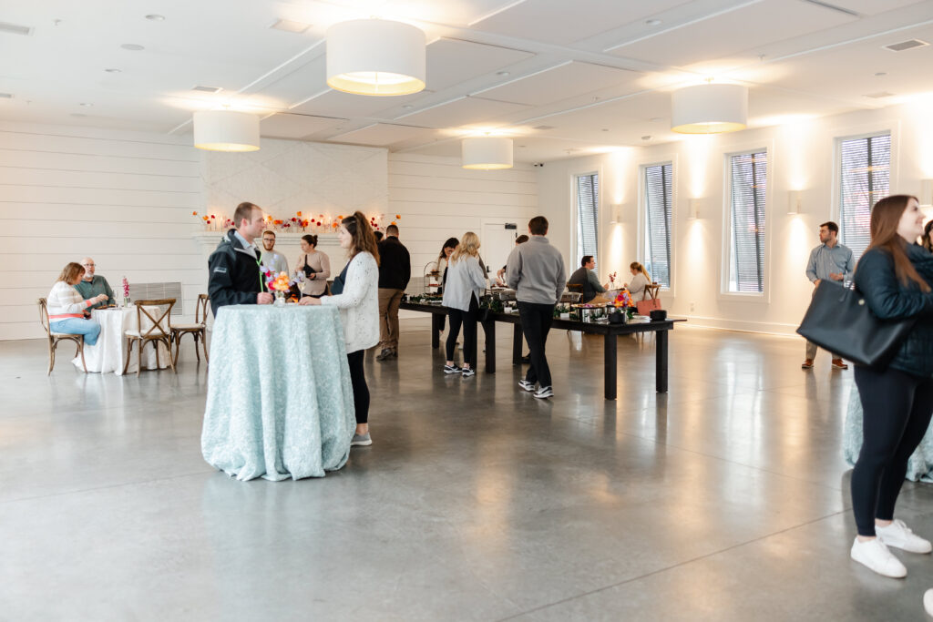 Guests enjoy light bites while they sip champagne before the ballroom dance class at The Hutton House