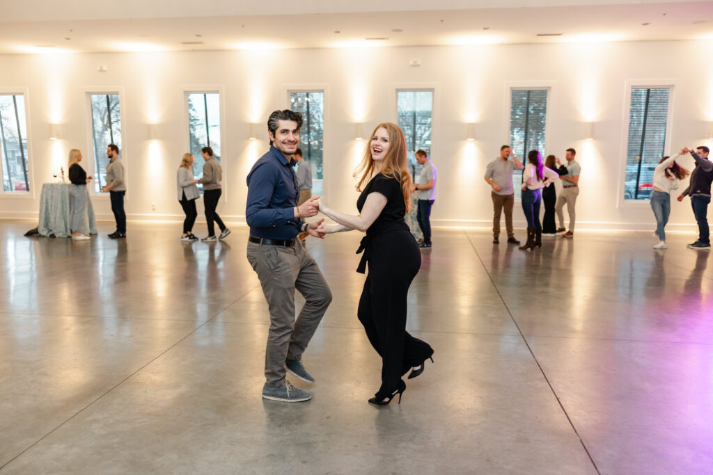 Guests learn the basics of ballroom and dance the night away at the Ballroom & Bubbles event hosted by Tulle Tuxedo at The Hutton House