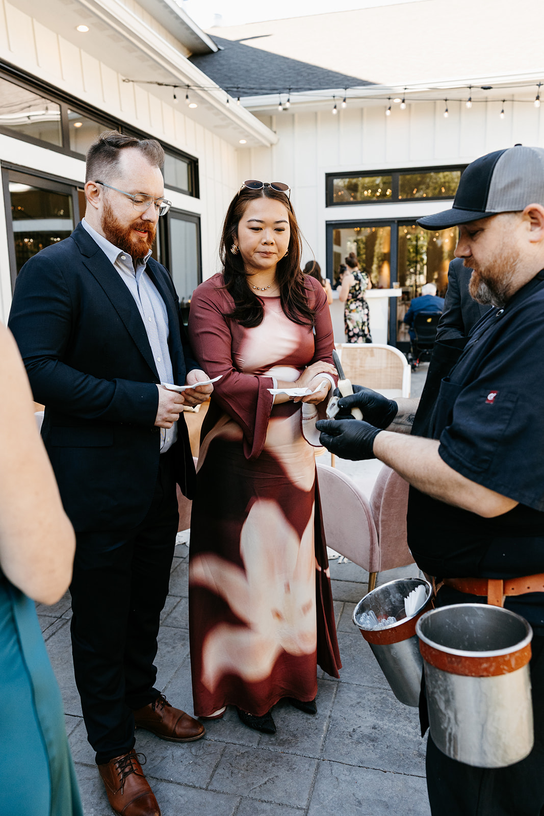 Roaming oyster shucking creates an immersive dinning experience at this luxury foodie wedding at The Hutton House
