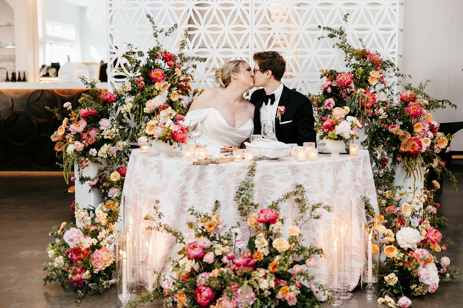 Newlyweds sweetheart table at The Hutton House wedding reception
